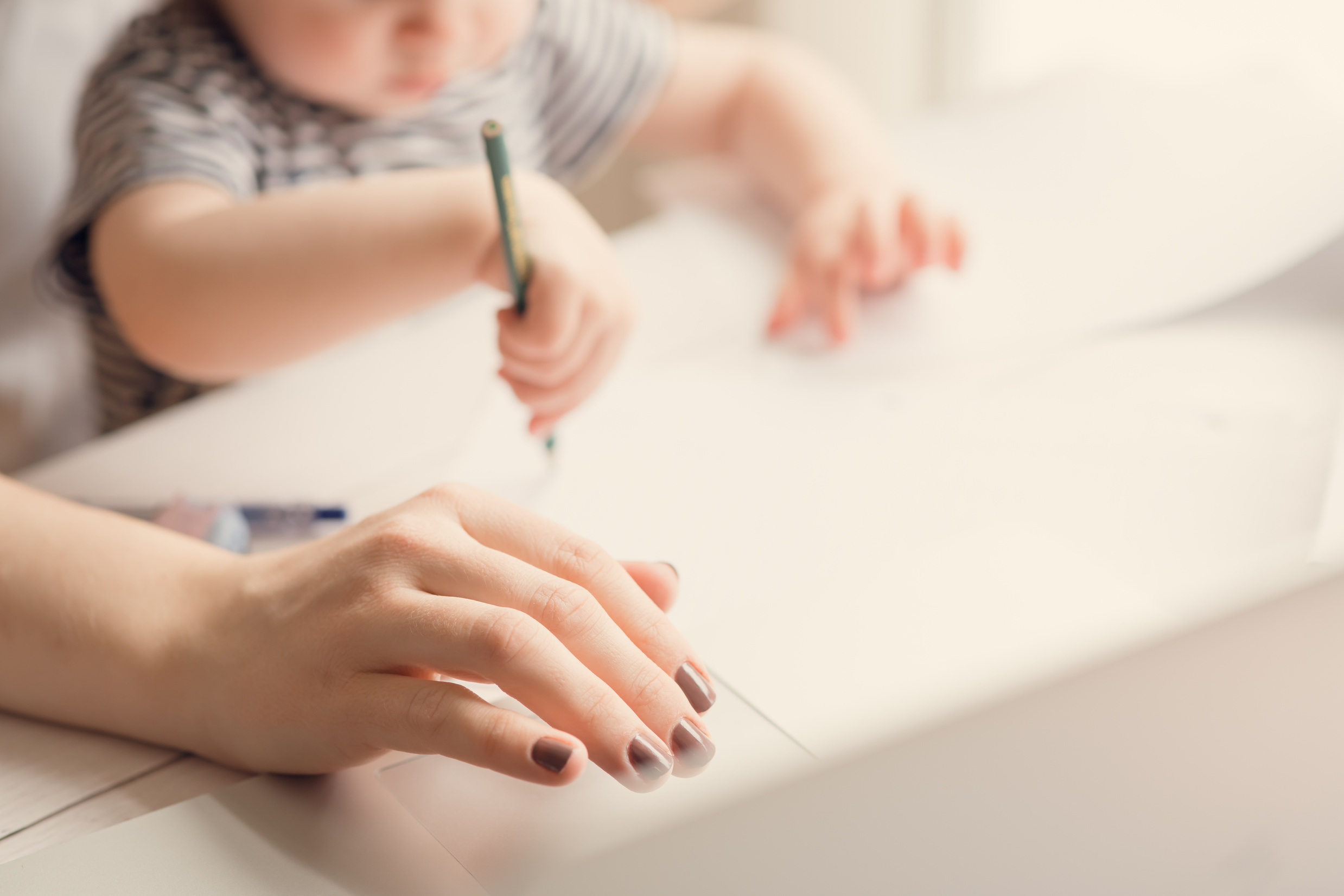 Mom working from home with baby on her lap